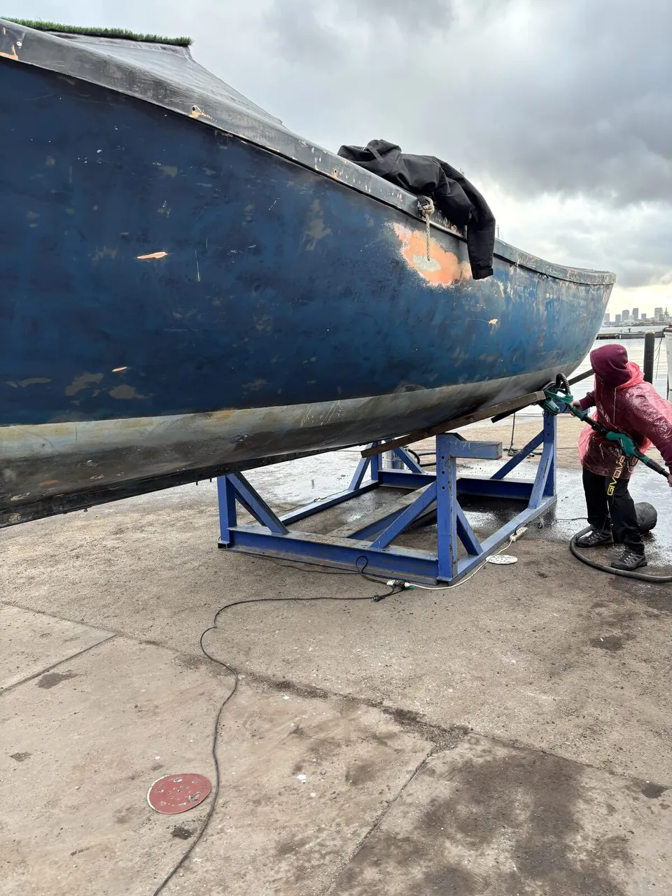 Sanding the hull before the new coats go on